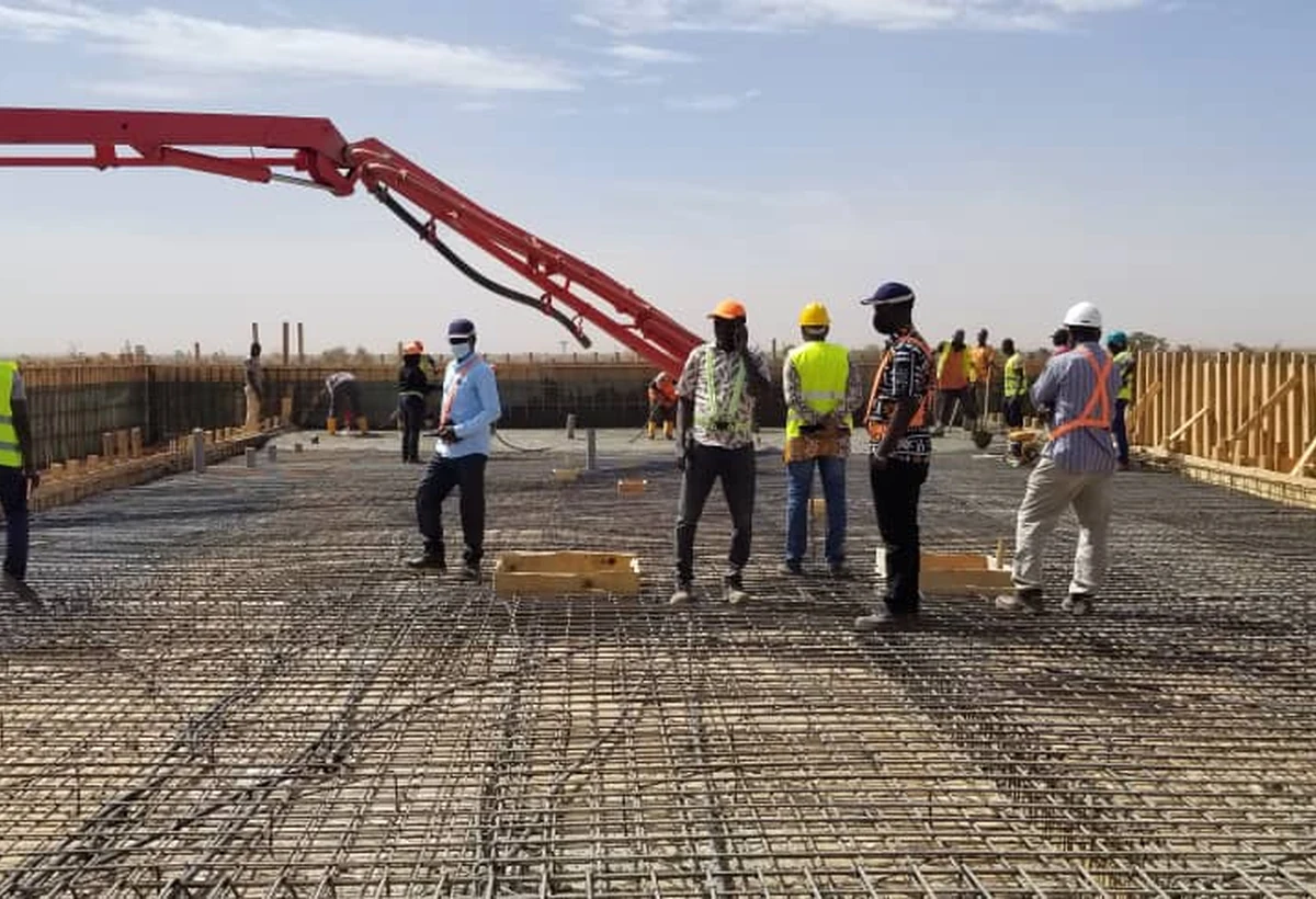 Équipe GESEB pendant des travaux de bétonnage